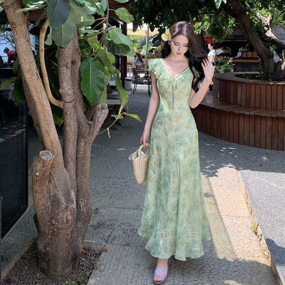 Fresh Beachy Getaway Dress In Green With A Dainty Floral Print And Cap Sleeves