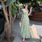 Fresh Beachy Getaway Dress In Green With A Dainty Floral Print And Cap Sleeves