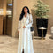 Elaborately Crafted Long Coat With Exquisite Floral Embroidery